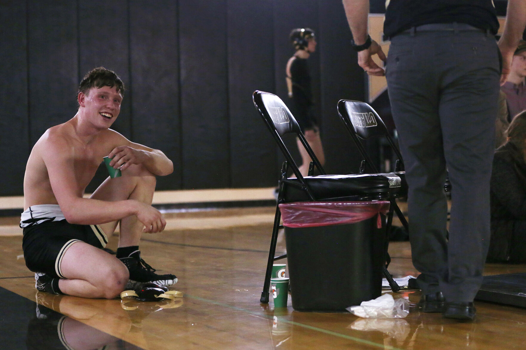 Ben Camino laughs with head coach Garrett Traylor